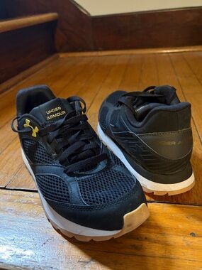 Under Armour Black Athletic Shoes with Gold Logo Accents